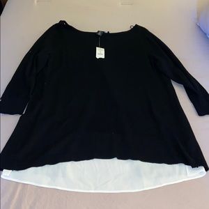 Black sweater w/ with Peekaboo white blouse.